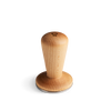 The Fellow Series 1 Tamper in Maple fits 58 mm portafilters and has a metal base.