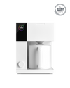 Fellow Aiden Precision Coffee Maker in matte white brews coffee easily into a matching mug.
