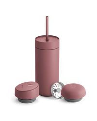 Fellow Carter 3-in-1 Lid System matte pink mug with straw and two containers on white background.