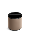 The Fellow Espresso Knock Box in Malted Chocolate has a swing lid and silicone-wrapped knock bar.