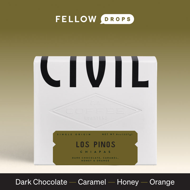 White coffee bag labeled Los Pinos Bourbon by Civil Coffee Store, with chocolate, caramel, honey, orange notes.