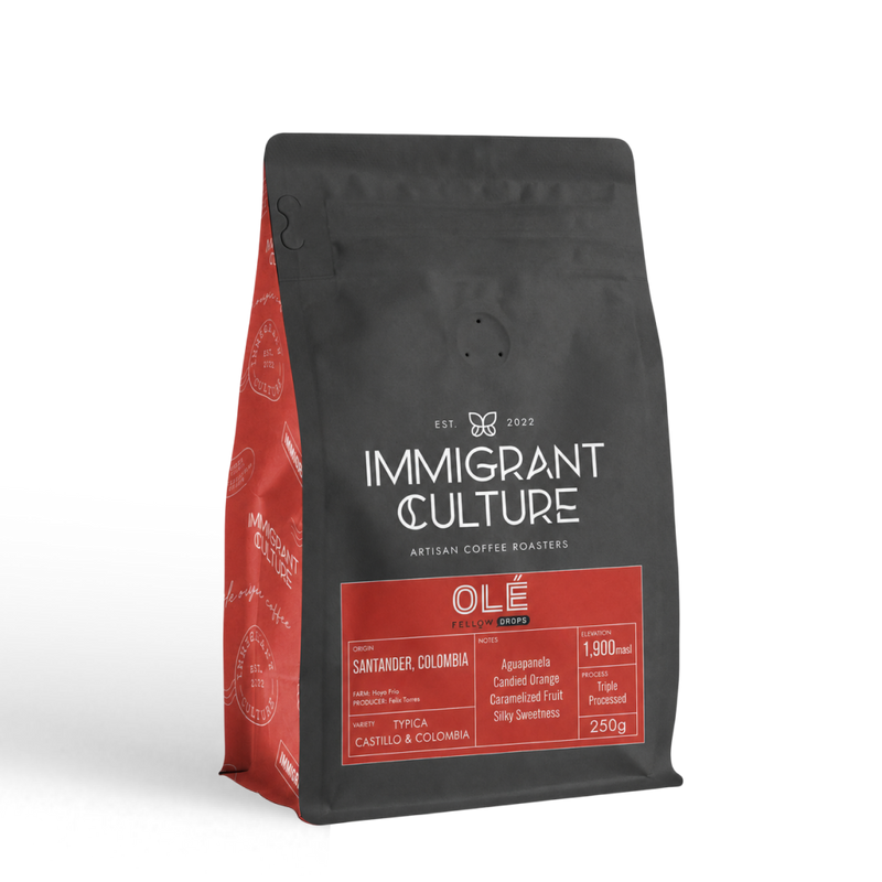 Black and red 250g Olé coffee bag by Immigrant Culture, medium roast, Colombian origin.