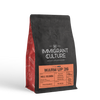 Warm Up 26 light roast bag, black/red, by Immigrant Culture—Huila, Colombia.