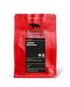 Red bag of Equator Coffees Jaguar Espresso with sun-dried coffee notes on the front.