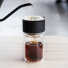 Stagg EKG brewing coffee into Stagg [X] Dripper over a Stagg Tasting Glass