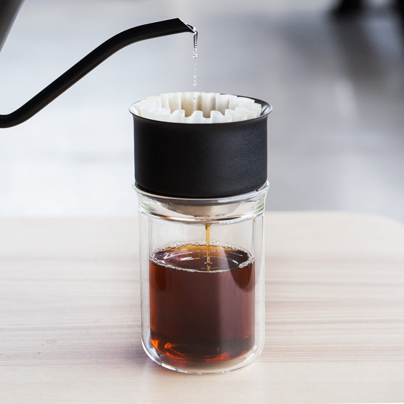 Stagg EKG brewing coffee into Stagg [X] Dripper over a Stagg Tasting Glass