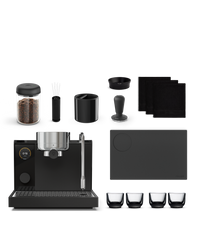 Fellow Series 1 + Accessories Kit: espresso machine, beans, cups, tamper, and mat.