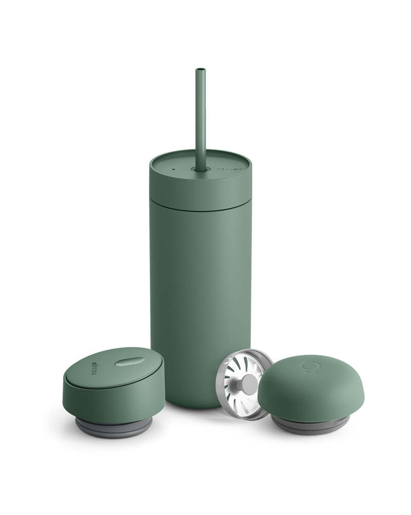 Fellow Carter 3-in-1 Lid System: matte green coffee mug with straw and two matching lids.