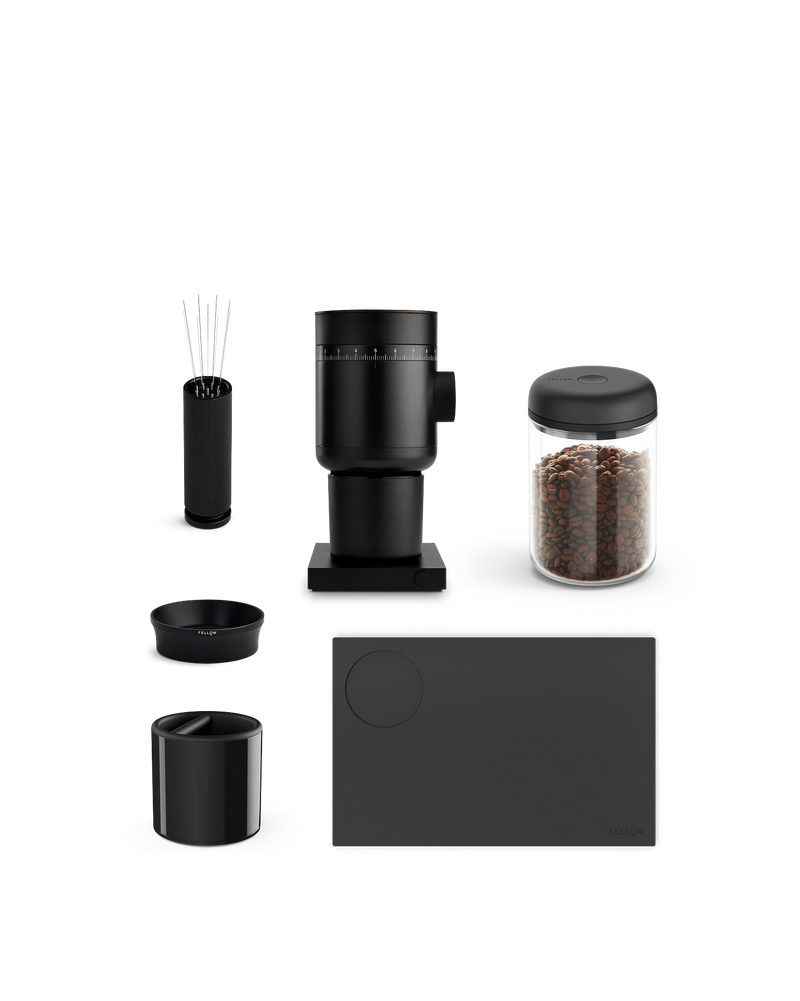 Fellow Opus 2 + Espresso Kit with accessories and beans arranged on a white background.