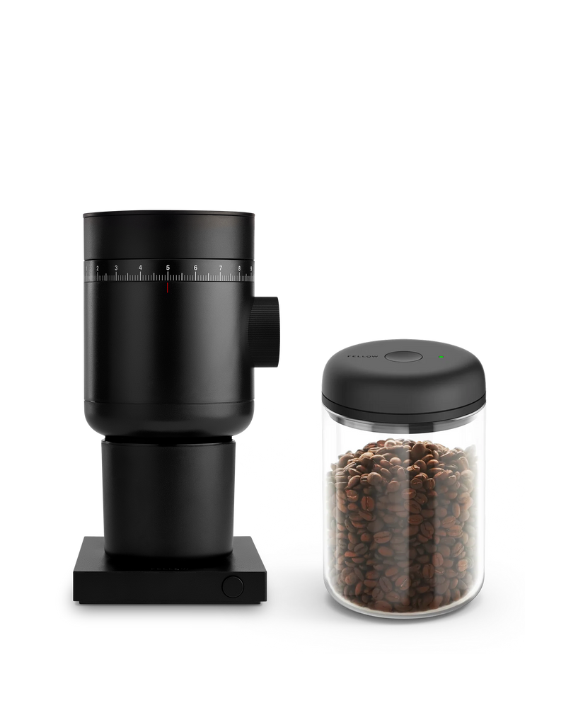 Fellow Grind It Kit: black coffee grinder & airtight bean jar on a white background.